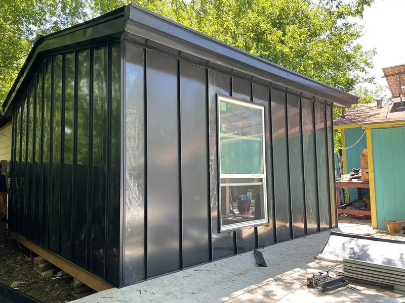 Black standing seam metal wall panels for Roof Inspection in Villa Park